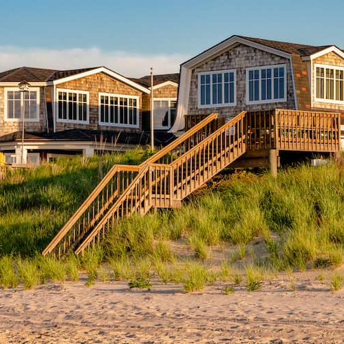 A beach house, symbolizing a coastal living environment or vacation property.
