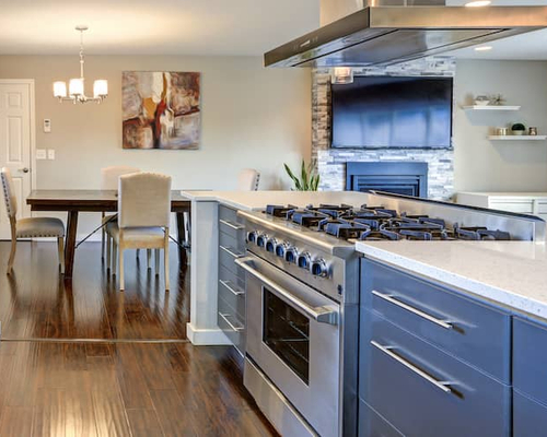 A kitchen with updated appliances, showcasing modern amenities in a household setting.