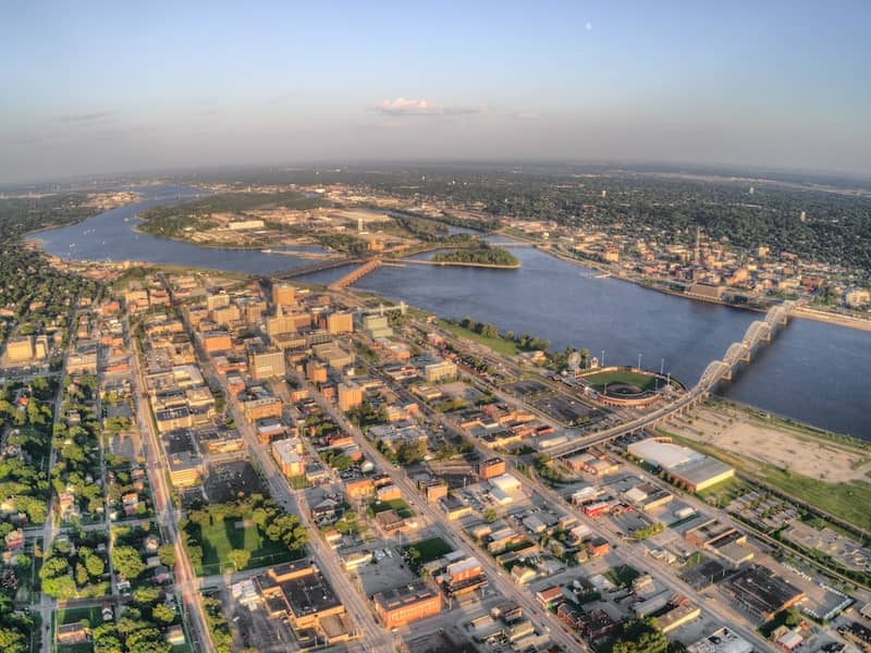 RHB Assets From IGX: Aerial view of Davenport, a coastal city with picturesque waterfront and cityscape.