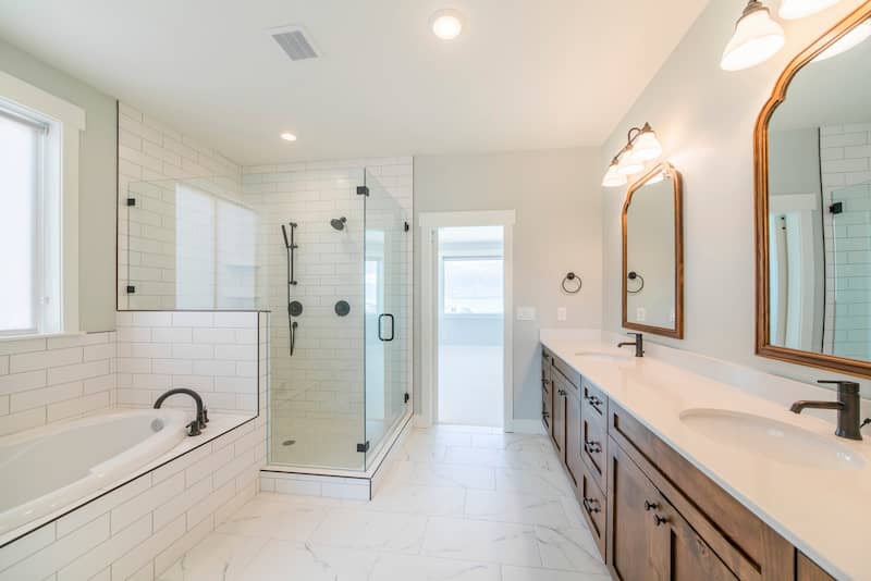 RHB Assets From IGX: White bathroom with marble tile floor