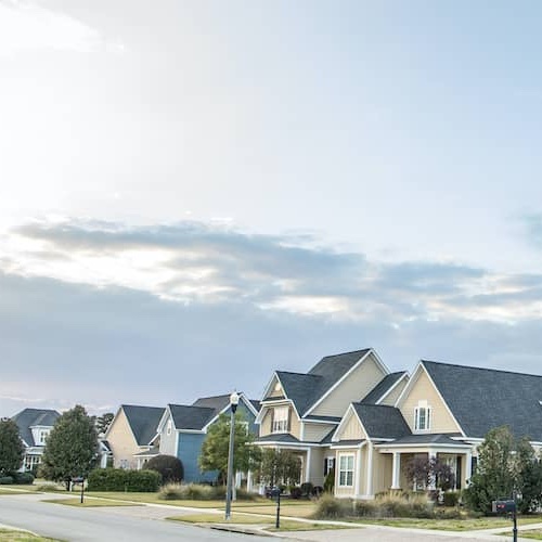 Line of houses in a suburban street.