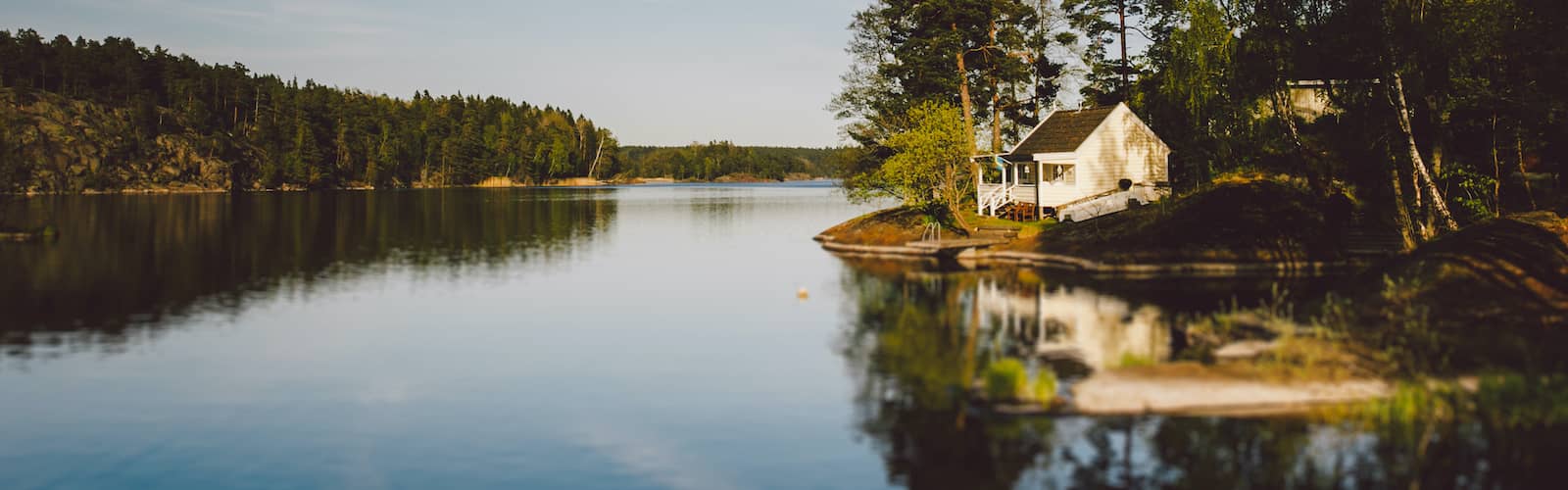 Lake house image, likely showcasing a house near a lake or waterfront property.