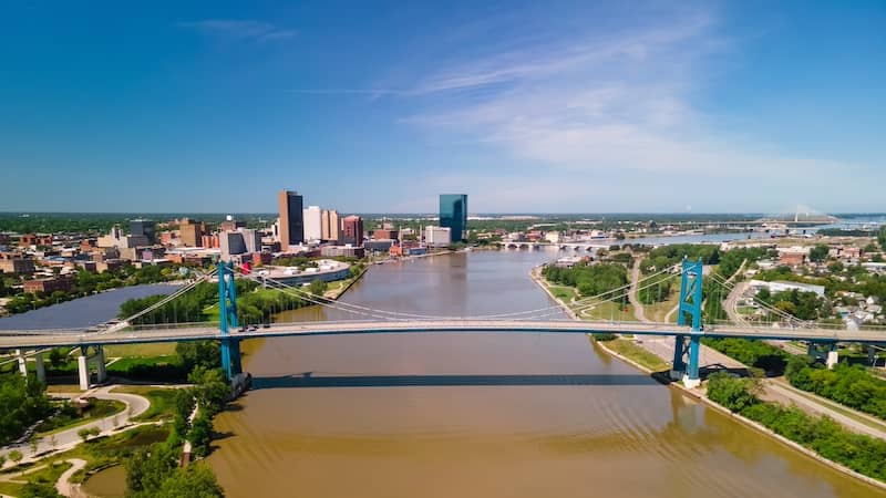 Aerial view of downtown Toledo, Ohio, featuring the Anthony Wayne bridge over the Maumee River.