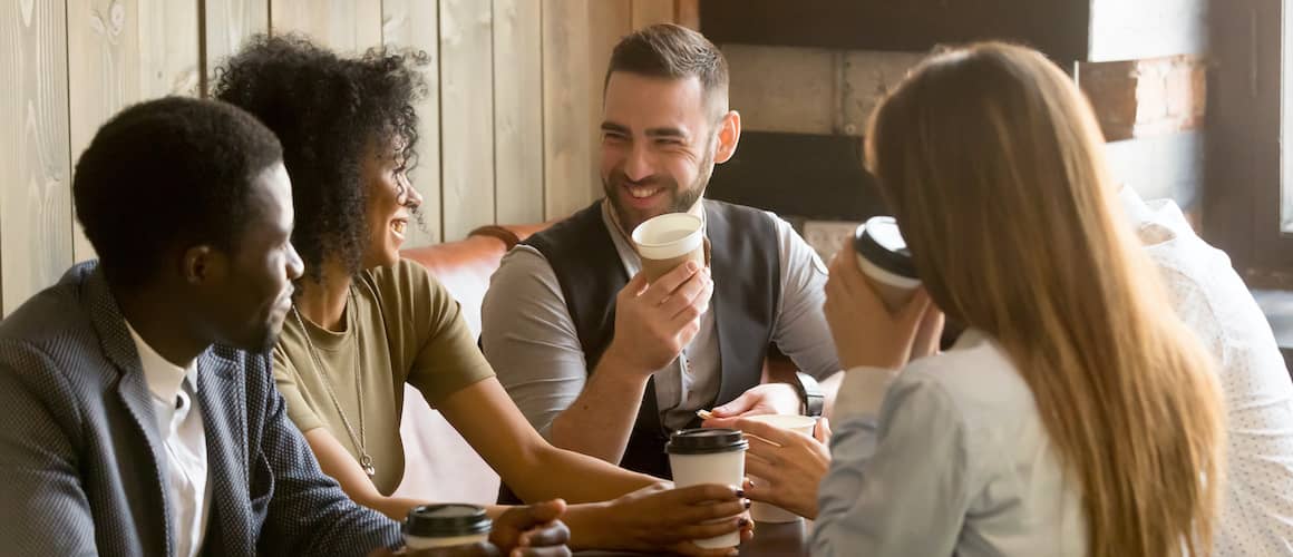 RHB Assets From IGX: A group of young professionals enjoying coffee together.