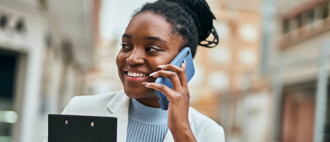 A woman on phone possibly talking to a client or a customer.