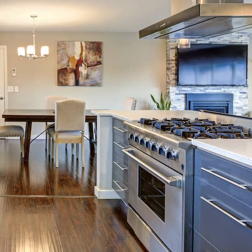 A kitchen with updated appliances, showcasing modern amenities in a household setting.