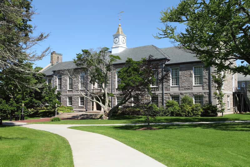 RHB Assets From IGX: University of Rhode Island campus featuring the iconic entrance and lush green lawns.