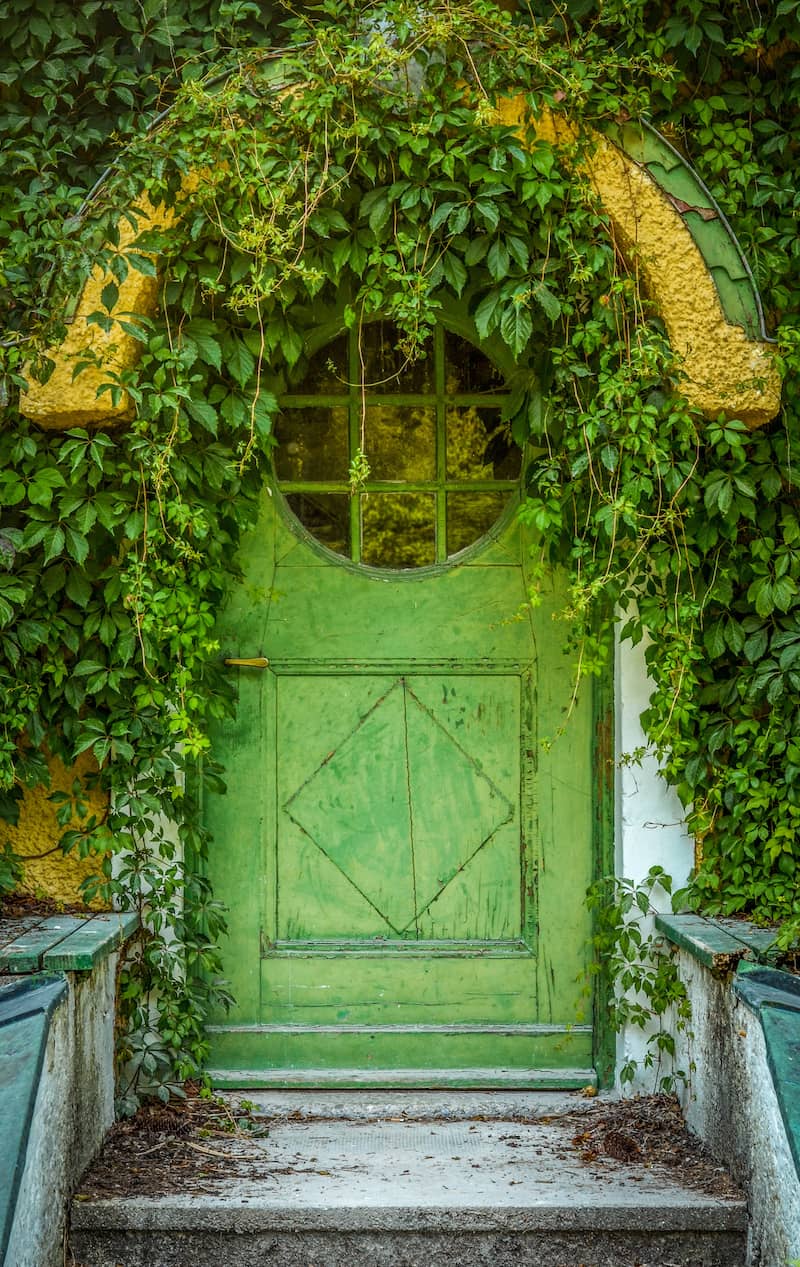 RHB Assets From IGX: Cottage-style front door with a wreath and decorative glass panels.