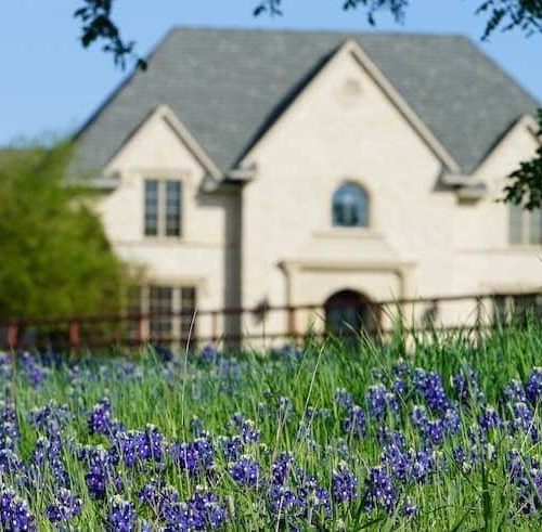 A countryside home, showcasing a rural residence with natural surroundings.
