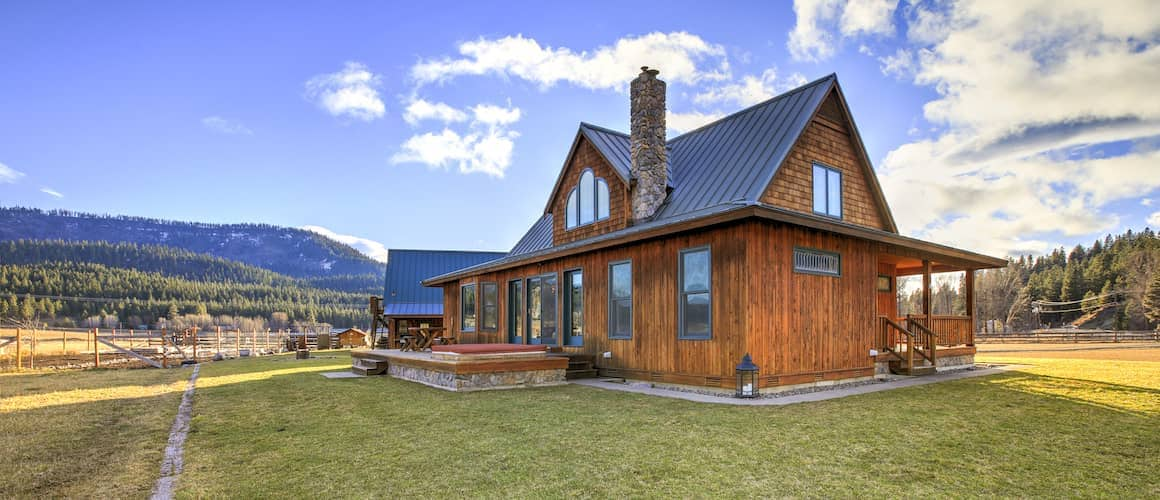 Cabin house on rural land, representing rural or countryside living.