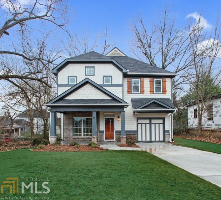 RHB Assets From IGX: Charming Atlanta house with a red brick exterior and lush landscaping.