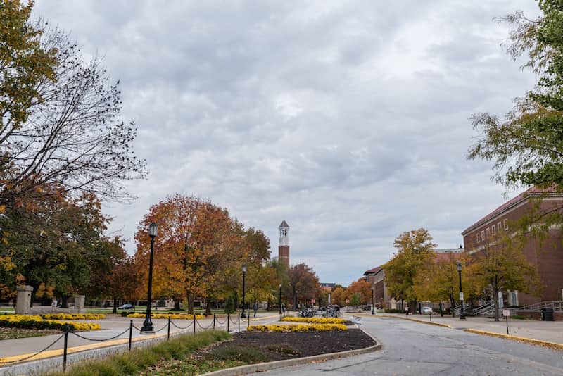 RHB Assets From IGX: Sunny day at Purdue University in Lafayette, Indiana with students walking near campus buildings.