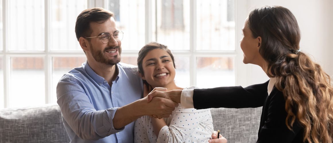 A handshake, symbolizing a mortgagor agreement or agreement between parties in a mortgage transaction.