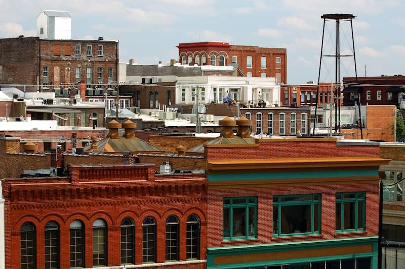 RHB Assets From IGX: Skyline of downtown Springfield, Missouri at dusk with colorful lights.