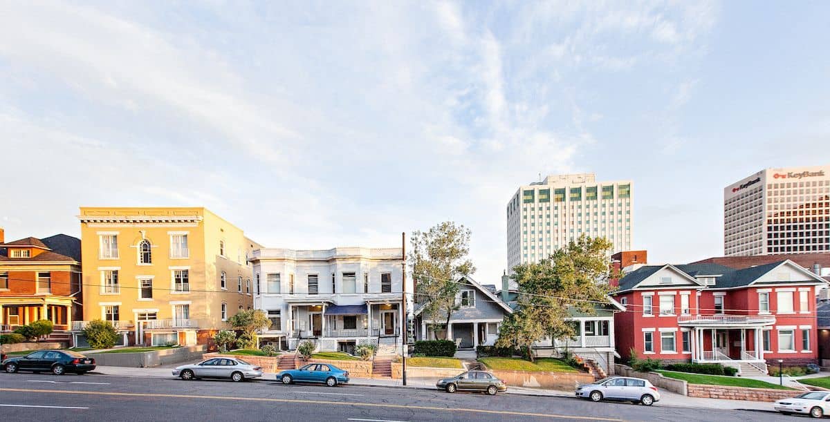 RHB Assets From IGX: A street with houses in a residential neighborhood.