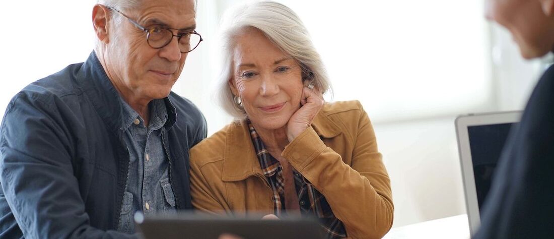 Stock-Older-Couple-Looking-At-Stock-Portfolio-Adobe-Stock-238385550-copy-compressor.jpeg