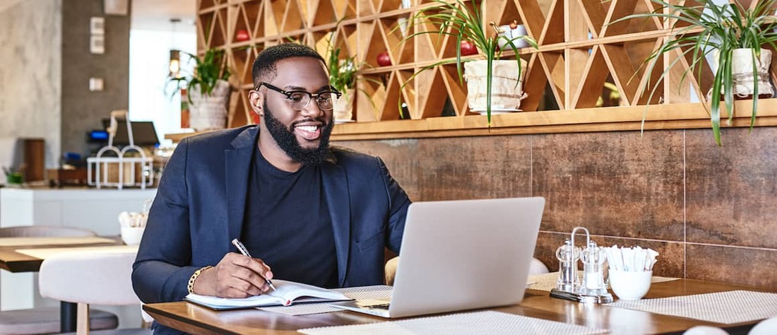 African-American man in coffee shop.