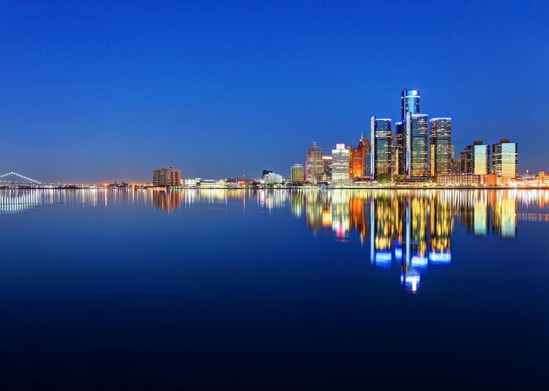 View of Detroit skyline from the Detroit RIver at night.