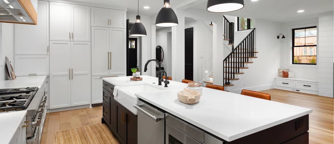 RHB Assets From IGX: Remodeled white kitchen with modern appliances