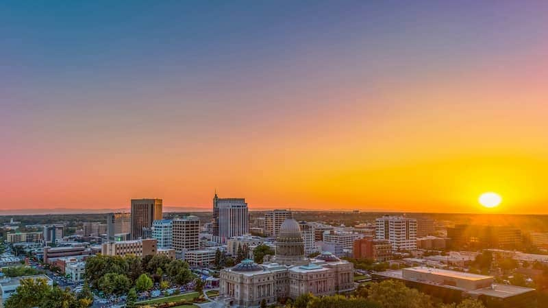 Cityscape view of a city in Idaho with the setting sun.