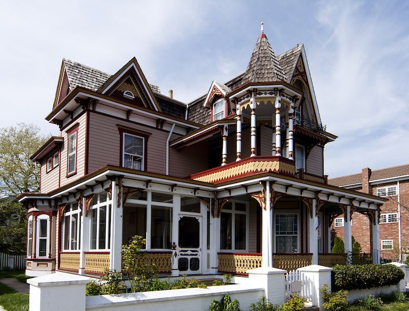 RHB Assets From IGX: Large Victorian home with intricate details and landscaping