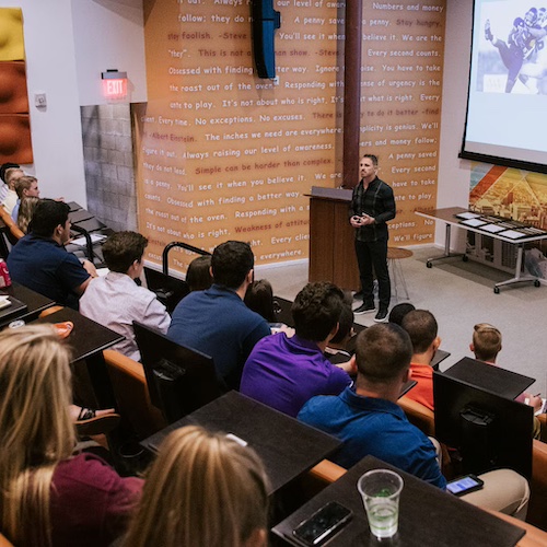 Group of interns watching a presentation.