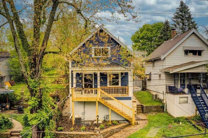 RHB Assets From IGX: Exterior of a Fort Thomas, Kentucky home with a lush front yard.