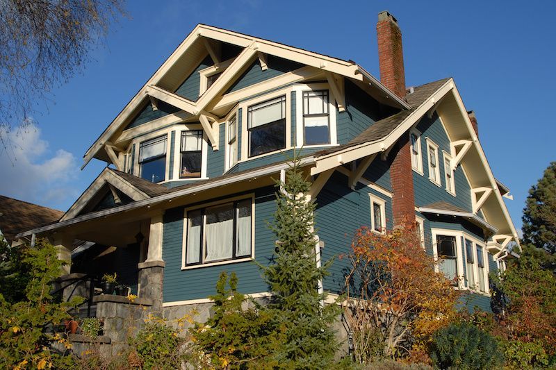 Blue Craftsman style home.