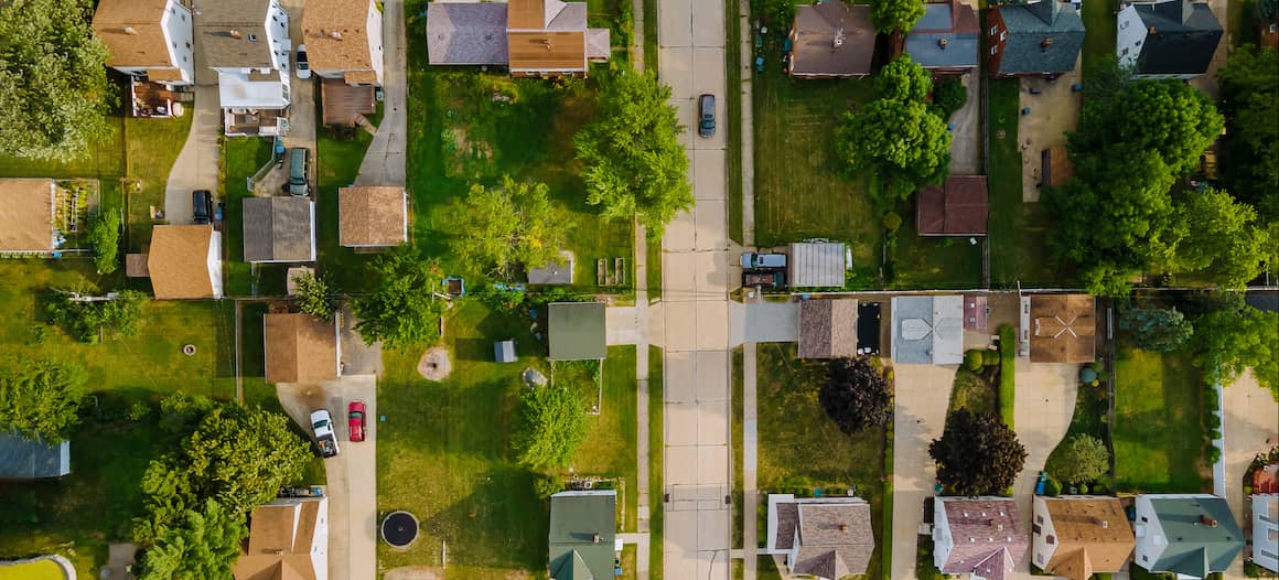 RHB Assets From IGX: Aerial view of houses in a suburban neighborhood