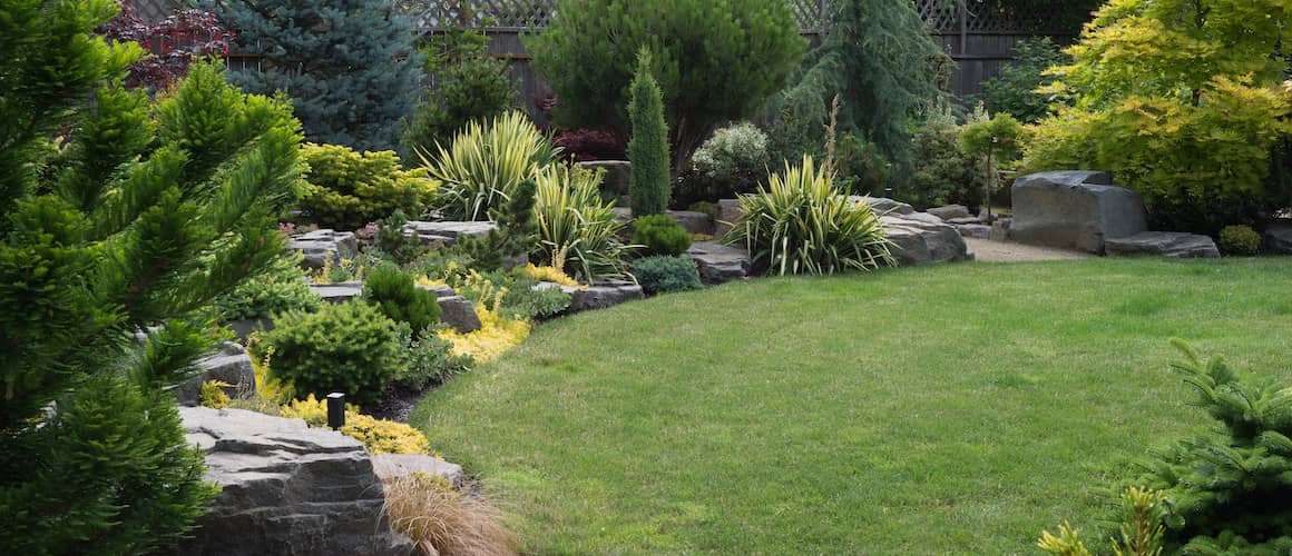 Landscaped yard and porch.