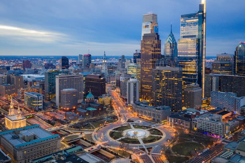 RHB Assets From IGX: Aerial view of Logan Circle neighborhood in Philadelphia with green trees and historical buildings.