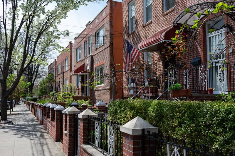 RHB Assets From IGX: A street view of a neighborhood in Queens, New York.