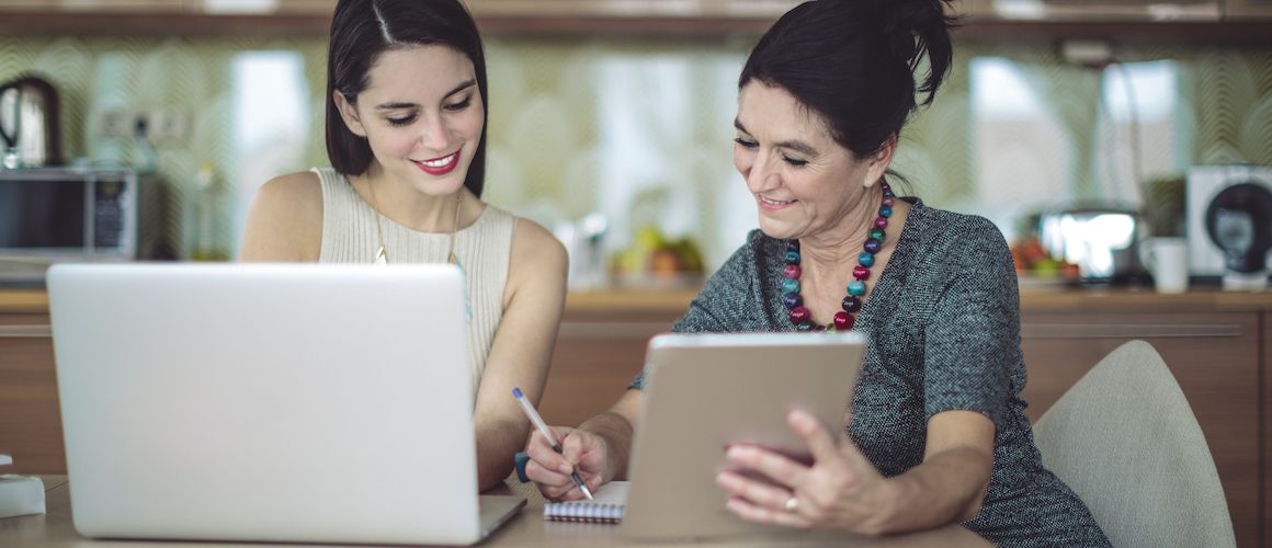 Stock-Mother-And-Daughter-With-Technology-iStock-1020587154-compressor.jpg