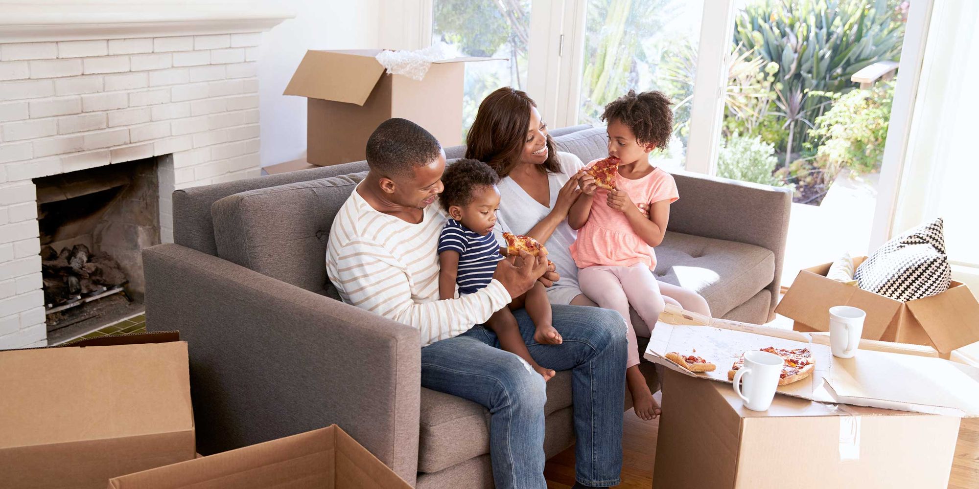 RHB Assets From IGX: Family hanging out in the living room of their dream home