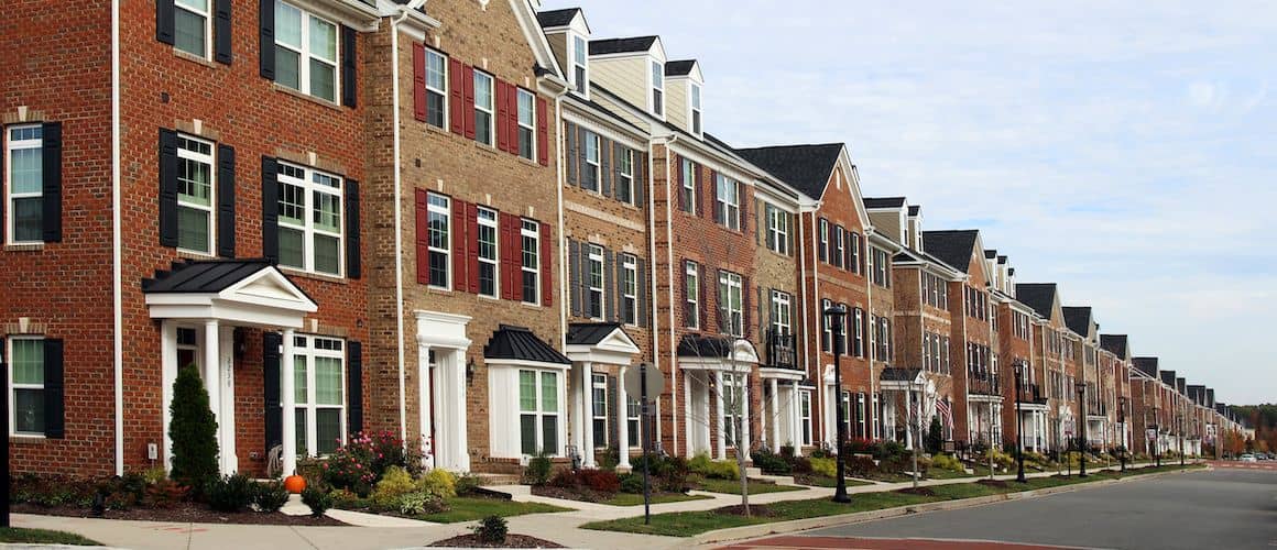 Row of townhouses in Virginia, showcasing the neighborhood's architecture and landscaping.