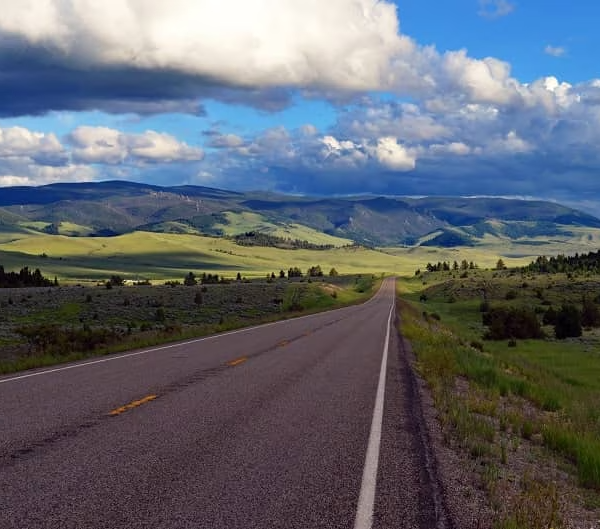 Thick clouds over a stretch of highway in Montana.