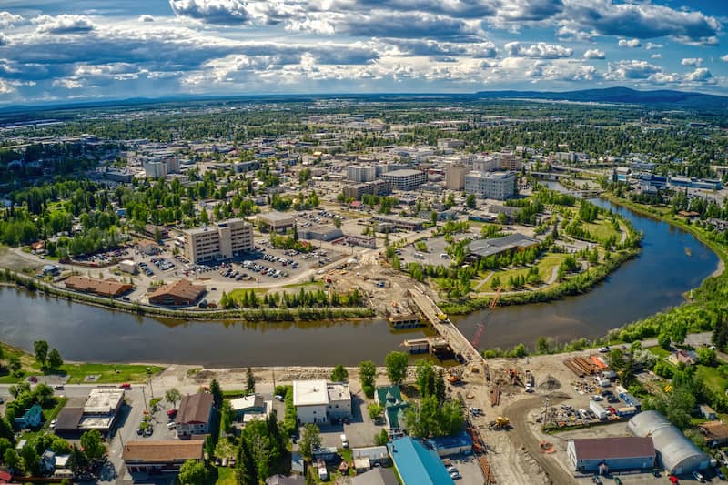 RHB Assets From IGX: A stunning view of Fairbanks, Alaska with mountains in the distance.