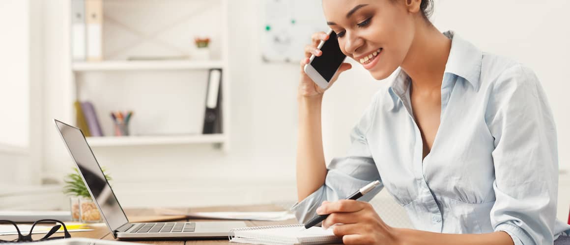 Woman on phone and doing business.