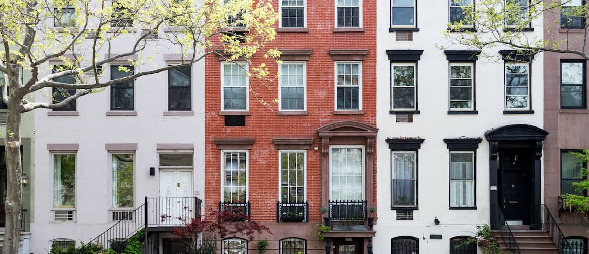 Historic brownstones in NYC, showcasing classic architectural buildings in New York City.