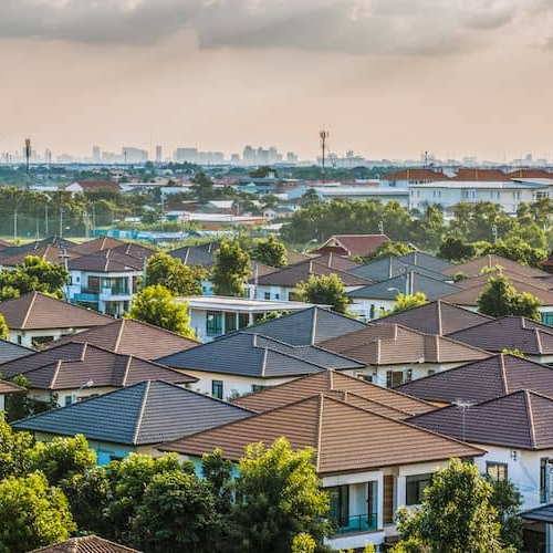 Rooftops in a neighborhood, portraying a community or residential area.