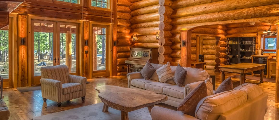 Interior of a wood cabin house, showcasing the interior design of a wooden cabin.