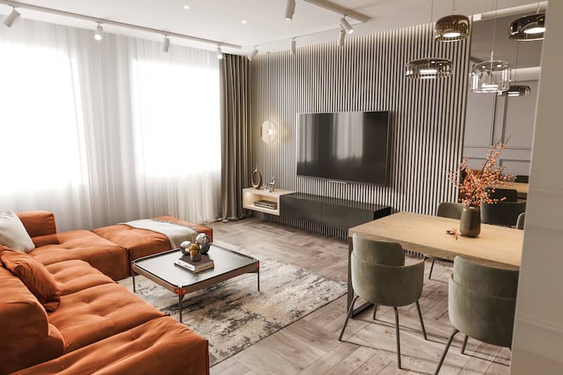 RHB Assets From IGX: Contemporary living room with a vibrant accent wall and modern furnishings.