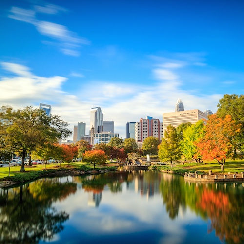 View of downtown Charlotte skyline from water.