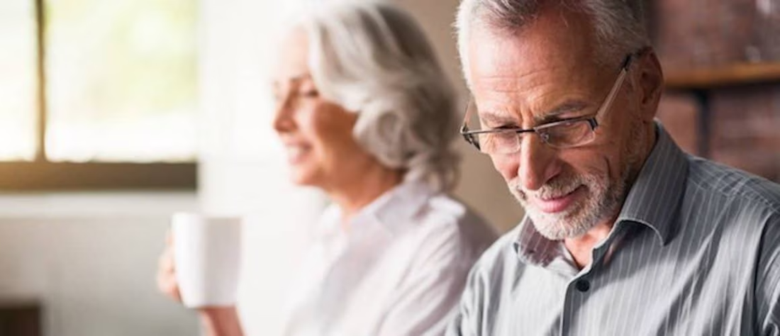 Older couple. sitting together in the morning.