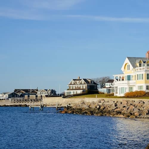 Luxury homes along Rhode Island coastline.