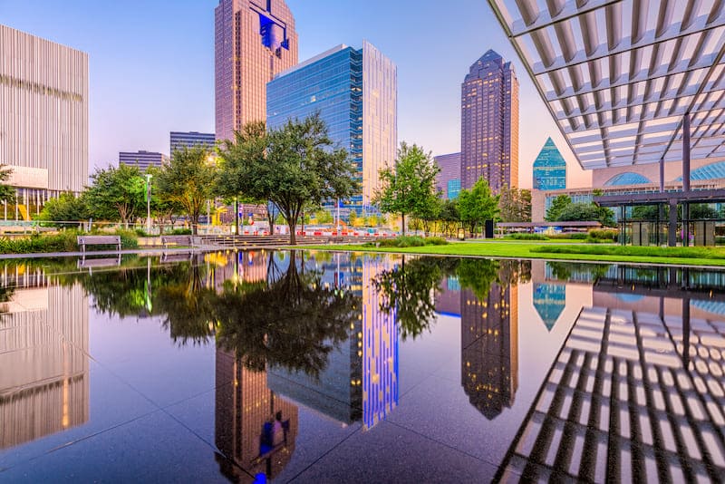 RHB Assets From IGX: Dallas, Texas skyline featuring prominent skyscrapers and a clear blue sky.