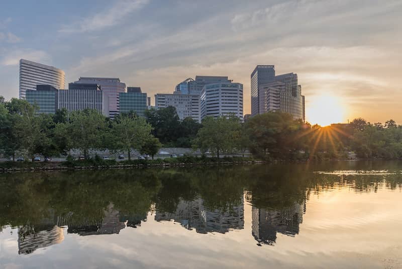 RHB Assets From IGX: Skyline of Arlington, Virginia, with modern buildings and blue sky.