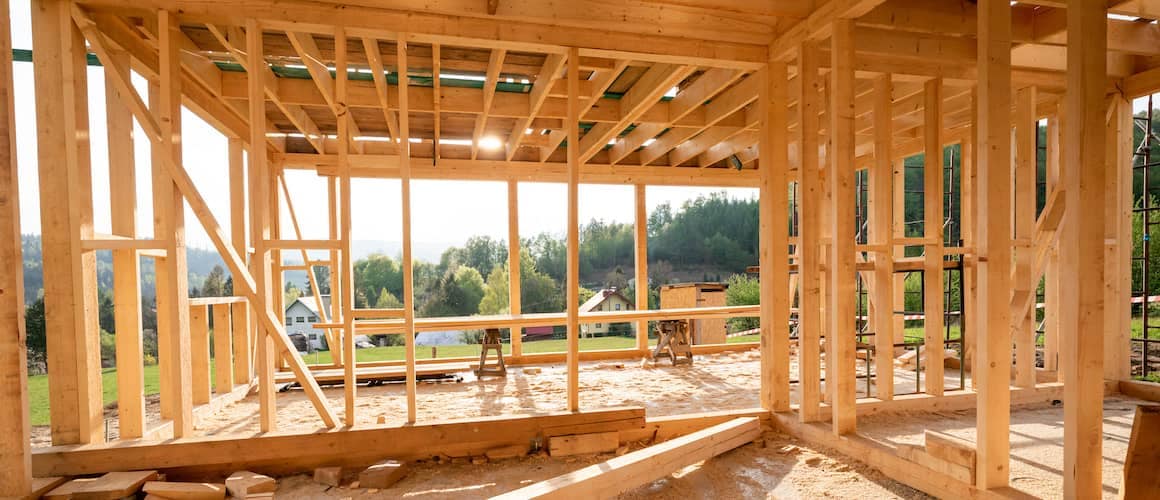 Interior frame of a new house under construction, showing the structural development of a new home.