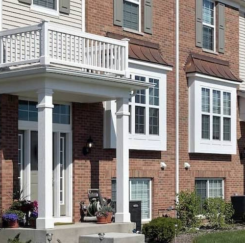 An illustration of a multifamily home, depicting residential housing for multiple families or tenants.