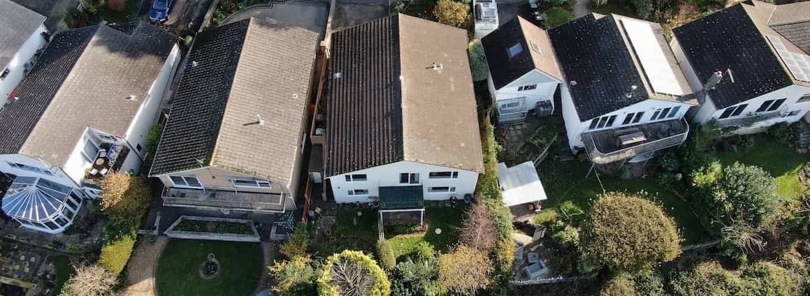 Aerial view of row houses, showcasing a neighborhood or residential area with row-style housing.